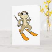 Affe als Skifahrer mit Ski Karte (Gelbe Blume)