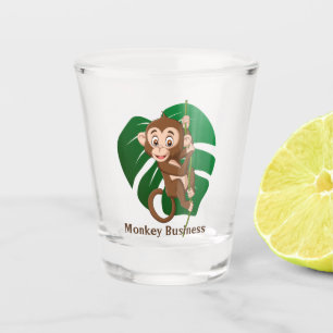 Affe auf einem Scheitelglas Schnapsglas
