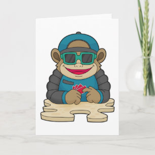 Affe beim Poker mit Pokerkarten und Sonnenbrille Karte