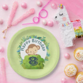 Affe, die sich von hinter einem Bush Geburtstag ab Pappteller (Party)