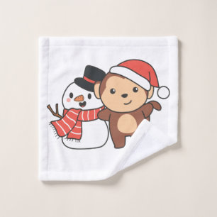 Affe mit Schneemann im Winter zu Weihnachten Waschlappen