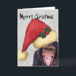 Affe-Sankt-Weihnachten Feiertagskarte<br><div class="desc">Lustige Weihnachtskarte mit einem lachenden Affen,  der eine rote Weihnachtsmannmütze trägt. Ist oben kundengerechter Text "frohe Weihnachten" im sehr schlechten Drucken. Innerhalb ist ein Platz für kundengerechteren Text.</div>