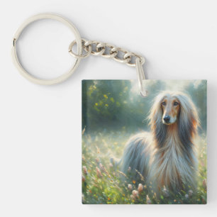 Afghan Hound auf einer Blumenwiese Kunst Schlüsselanhänger