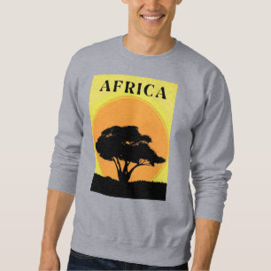 Afrikanischer Akazienbaum gegen einen orangefarben Sweatshirt