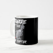Afrikanischer Graupapagei vor dem winzigen Raptor Kaffeetasse (Vorderseite Links)