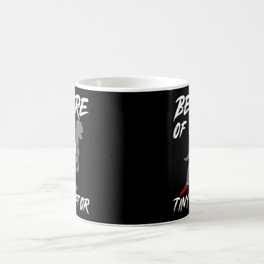 Afrikanischer Graupapagei vor dem winzigen Raptor Kaffeetasse (Mittel)