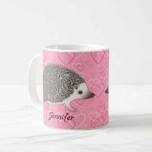 Afrikanischer Pygmäen-Igel auf rosa Herzmuster Kaffeetasse (Vorderseite Links)