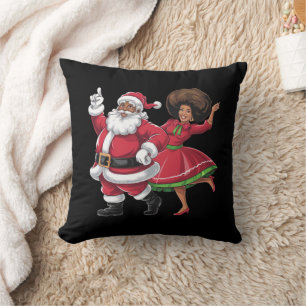 Afrikanischer Weihnachtsmann Frau Claus tanzt amer Kissen
