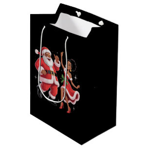 Afrikanischer Weihnachtsmann Frau Claus tanzt amer Mittlere Geschenktüte