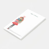 Afrikanisches amerikanisches Weihnachtsmädchen mit Post-it Klebezettel (angewinkelt)