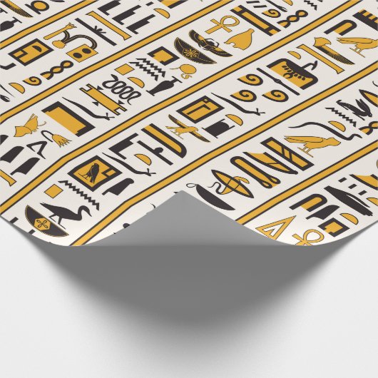 Ägyptische Hieroglyphen in gelb-schwarzer Farbe na Geschenkpapier (Ecke)