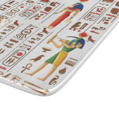 Ägyptische Hieroglyphen und Gottheiten aus Gold au Schneidebrett (Ecke)