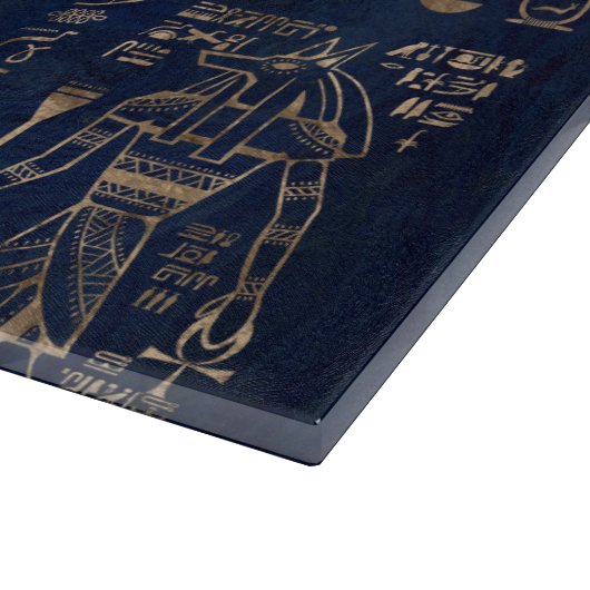 Ägyptische Hieroglyphen und Gottheitgold auf Schneidebrett (Ecke)