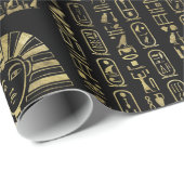 Ägyptische Hieroglyphen und Gottheitsgold auf Geschenkpapier (Rolleneckpunkt)