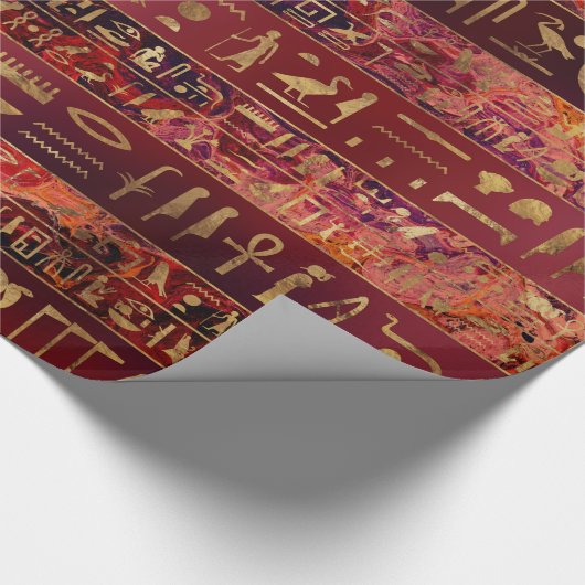 Ägyptisches Hieroglyphengold auf Rot gemalter Geschenkpapier (Ecke)