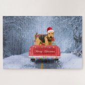 Airedale Terrier Dog in Snow sitzt zu Weihnachten Puzzle (Horizontal)