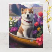 Akita Dog on a Paddle: Ein Landschaftliches Abente Karte (Gelbe Blume)