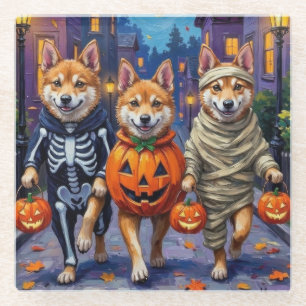 Akita-Hunde beim Trick-or-Treat in Halloween-Kostü Glasuntersetzer