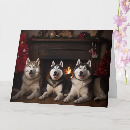 Alaskan Malamute am Feuerplatz Weihnachten Karte (Orchidee)