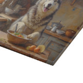 Alaskan Malamute Cooking in Kitchen Schneidebrett (Ecke)