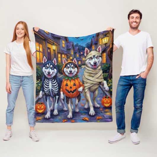 Alaskan Malamute Hunde Trick-or-Treating Halloween Fleecedecke (Beispiel)