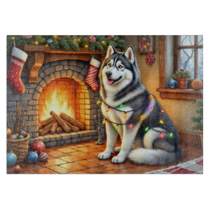 Alaskan Malamute Kamin mit Weihnachtslichtern Schneidebrett