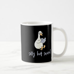 Albern, aber gerettet, Gans liest heilige Bibel, s Kaffeetasse