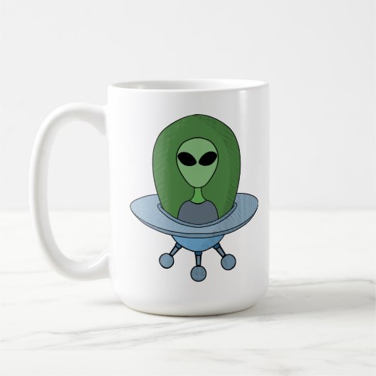 Alien in seinem kleinen Raumschiff Kaffeetasse (Links)