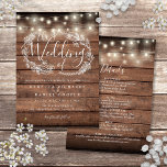 All In One Rustic Wood String Lights Wedding Einladung<br><div class="desc">A rustic wedding invitation featuring pretty string lights and a delicate hand-drawn rustic floral garland of botanical leaf foliage with stylish script typography,  on a rustic wood background. Personalize with all your special wedding day information on the reverse including your RSVP,  accommodation,  and additional details. Designed by Thisisnotme©</div>