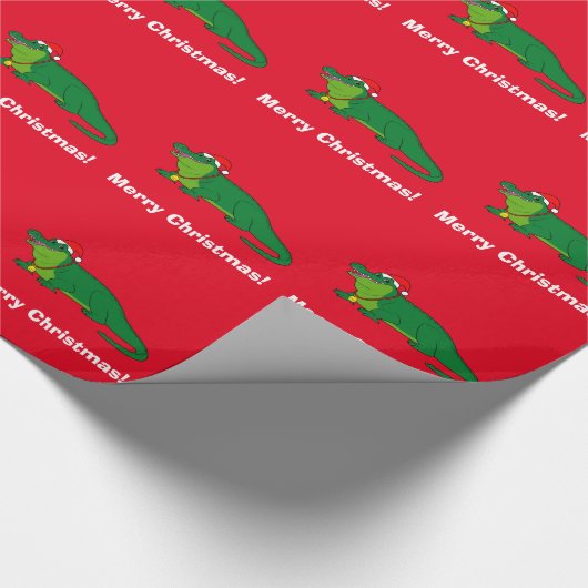 Alligator in einer Weihnachtsmannmütze Geschenkpapier (Ecke)