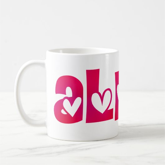 Alpha in den Herzen Kaffeetasse (Links)