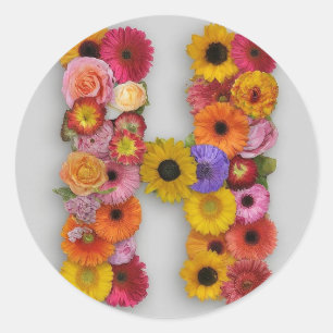 Alphabet H in Blume Runder Aufkleber
