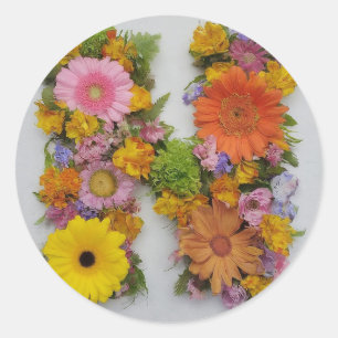 Alphabet N bei Blume Runder Aufkleber