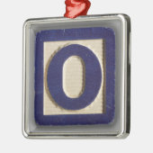 Alphabet-Spielzeug-Block O Ornament Aus Metall (Links)