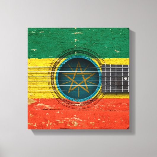 Alte akustische Gitarre mit äthiopischer Flagge Leinwanddruck (Vorderseite)