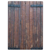 Alte braune Holztüren mit schwarzem Eisen unterstü Klemmbrett (Rückseite)