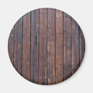 Alte braune Holztüren mit schwarzem Eisen unterstü Magnet