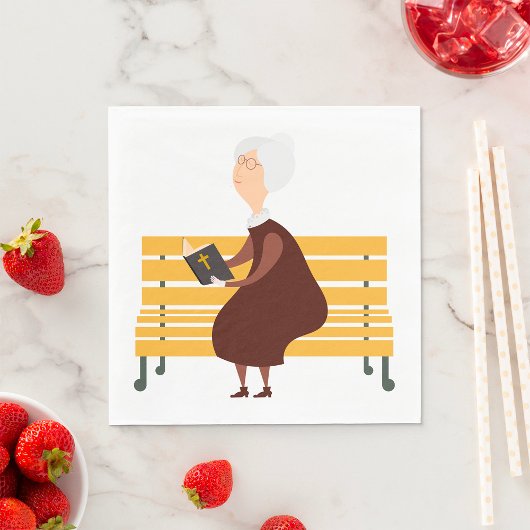 Alte Frau, die die Bibel liest Serviette