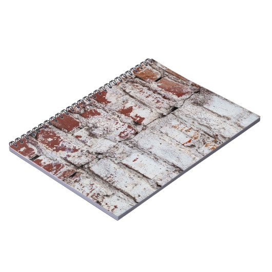 Alte gemalte Ziegelwand mit weißem Peeling Notizblock (Linke Seite)