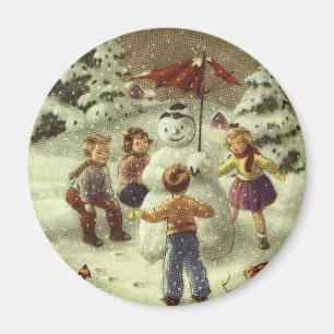 Alte Kinder beim Bau eines Schneemanns Magnet