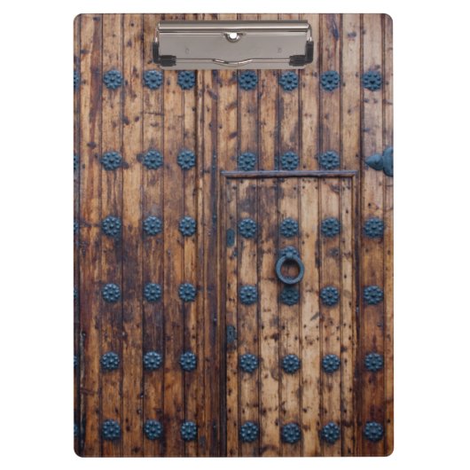 Alte kleine Tür innerhalb großer Türen Klemmbrett (Vorderseite)