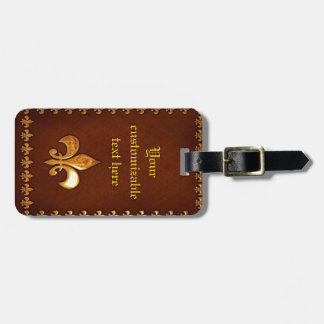 Alte Ledertasche mit goldenem Fleur-de-Lys - Gepäckanhänger