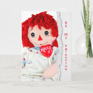 alte Lumpenpuppe mit Valentinsherz-Lutscher Karte