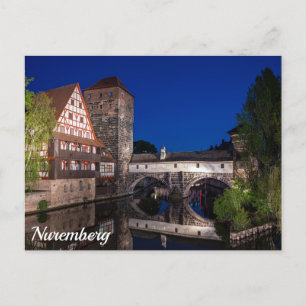 Alte mittelalterliche Brücke am Abend in Nürnberg Postkarte
