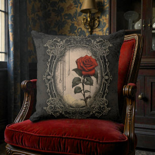 Alte viktorianische Schwärze mit roter Rose Kissen