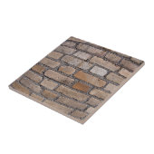 Alte Wand von den grauen und braunen Ziegelsteinen Fliese (Seite)