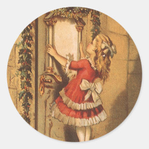Alte Weihnachts-Victorian-Mädchen hängt einen Girl Runder Aufkleber