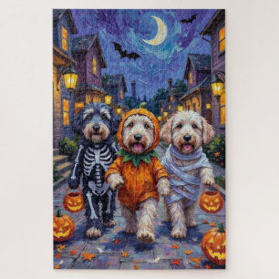 Altenglische Schäferhunde beim Halloween-Süßigkeit Puzzle