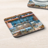 Alter und rostiger Atlas Imperial Diesel Motor in Getränkeuntersetzer (Linke Seite)