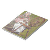 Ältere irische Frauenkraftlerin an einem Spinnrad Notizblock (Rotiert)